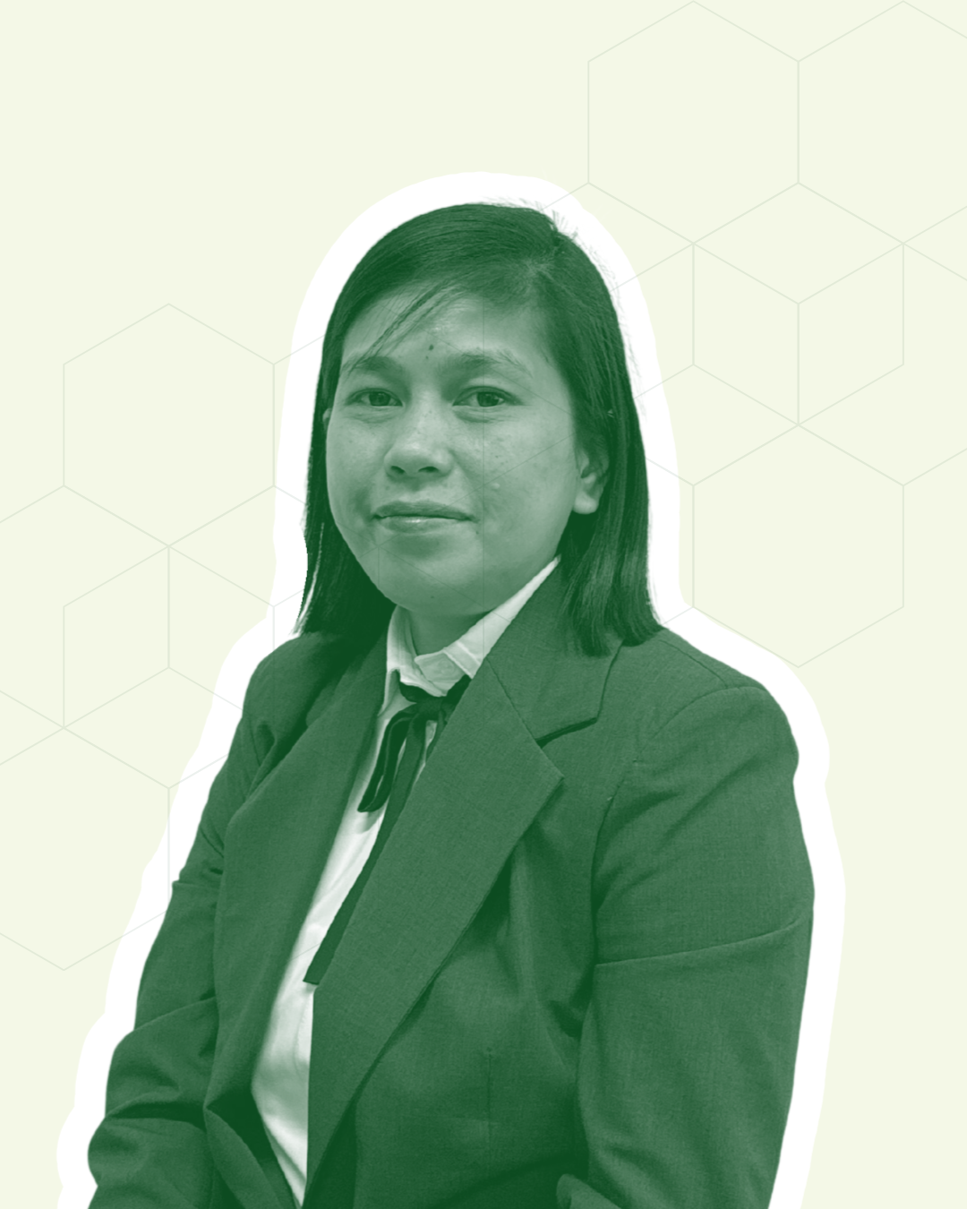 Person in green suit, neutral background.