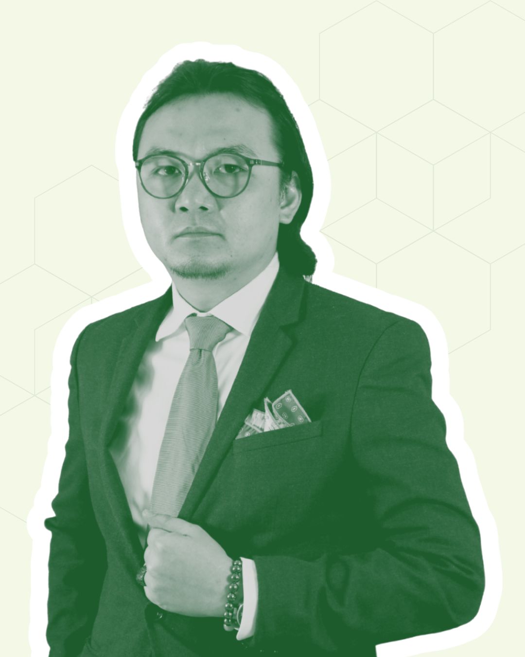 Man in suit with green background